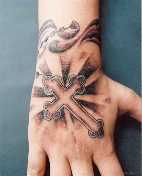 hand cross tattoo